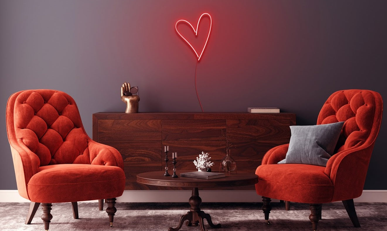 un néon décoratif led représentant un cœur rouge lumineux